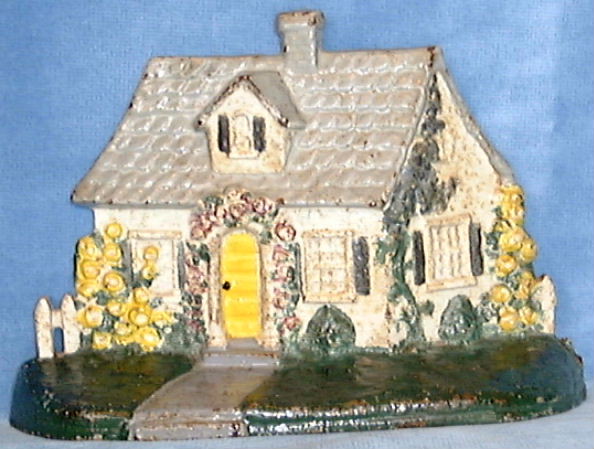 National's COTTAGE With FENCE DOORSTOP