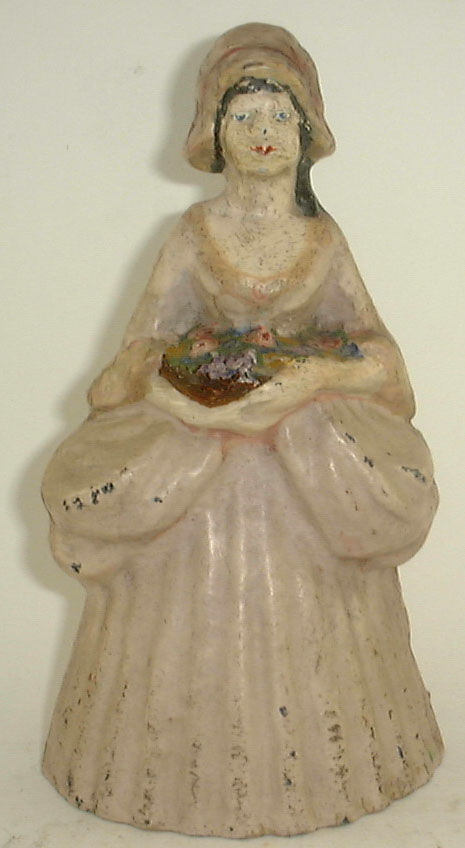 WOMAN HOLDING FRUIT Doorstop