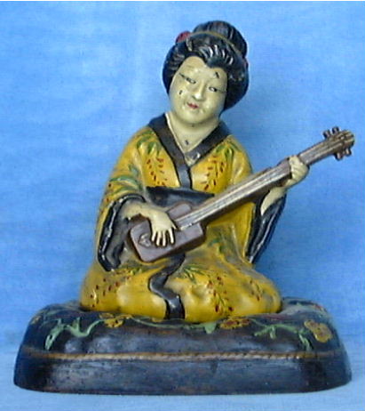 Hubley's GEISHA PLAYING SITAR Doorstop