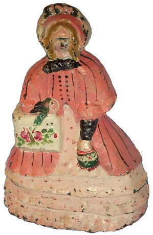 Woman with Hatbox and Purse doorstop